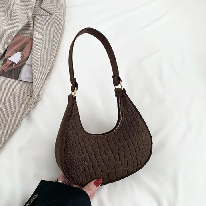 Faux leather bag with rough texture design