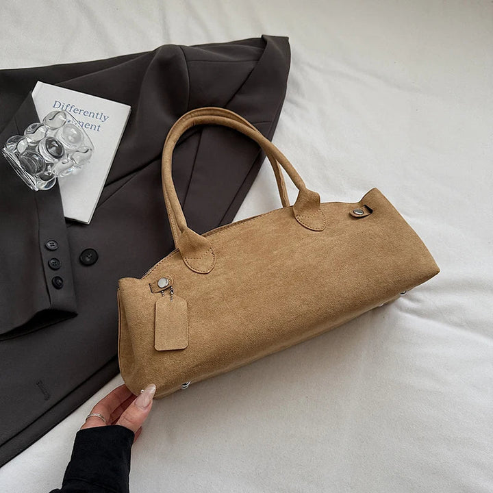 Suede bag with retro design