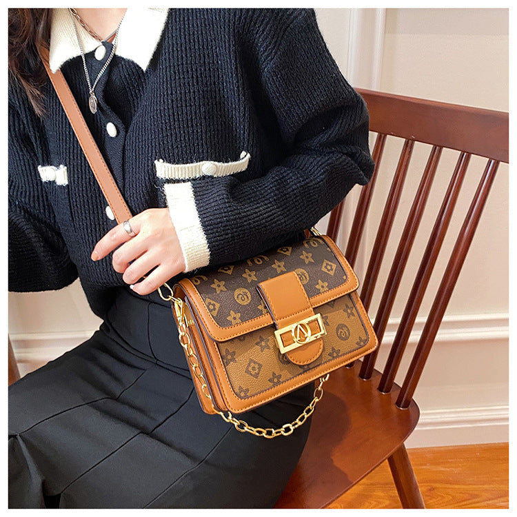 Bag with faux leather design