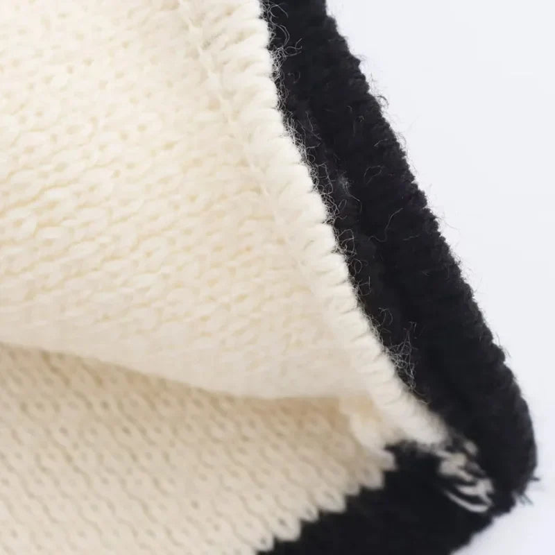 סוודר קשירות - מונה