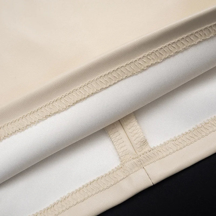 Faux leather mini dress with pleats - SIERA