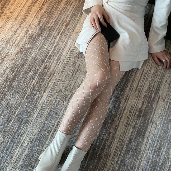 Tights in a variety of textures and shades: lace / hearts / bows / butterflies / mesh / sequins / stars