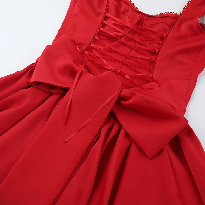 שמלת מיני בגזרת A קשירה בגב בעטור פפיון - דמי