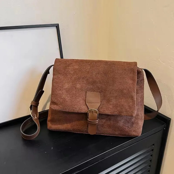 Suede bag with retro design