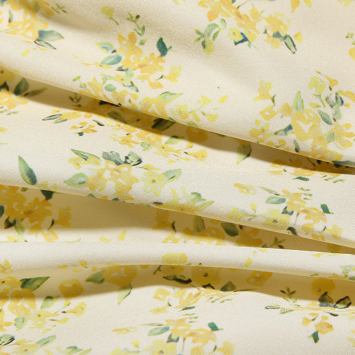 שמלת מיני קיץ פרחונית מחשוף V - עמליה