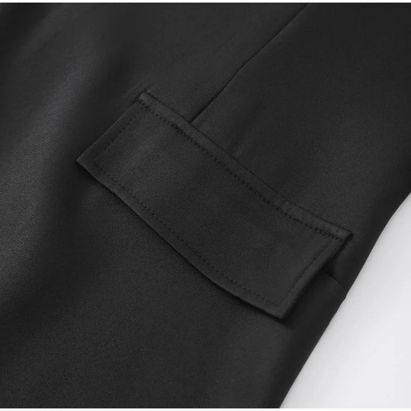 שמלת מיני מחויטת בגזרת שעון חול בעיטור כיסים - נילס