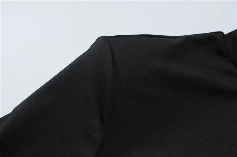 שמלת מיני בעיצוב מיוחד בעיטור אבזם ושובל - מורגן