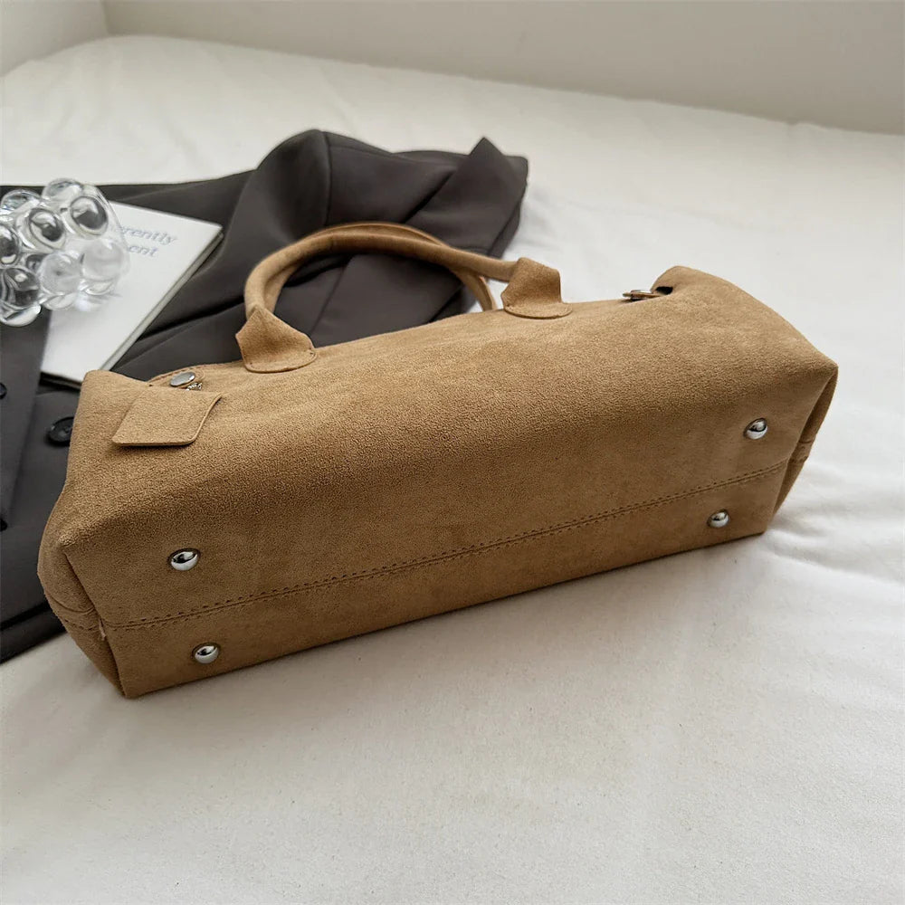 Suede bag with retro design