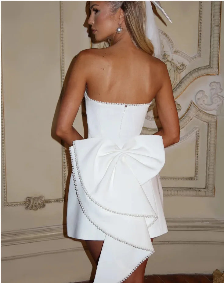 שמלת מיני סטרפלס בעיטור פפיון ופנינים - מארין