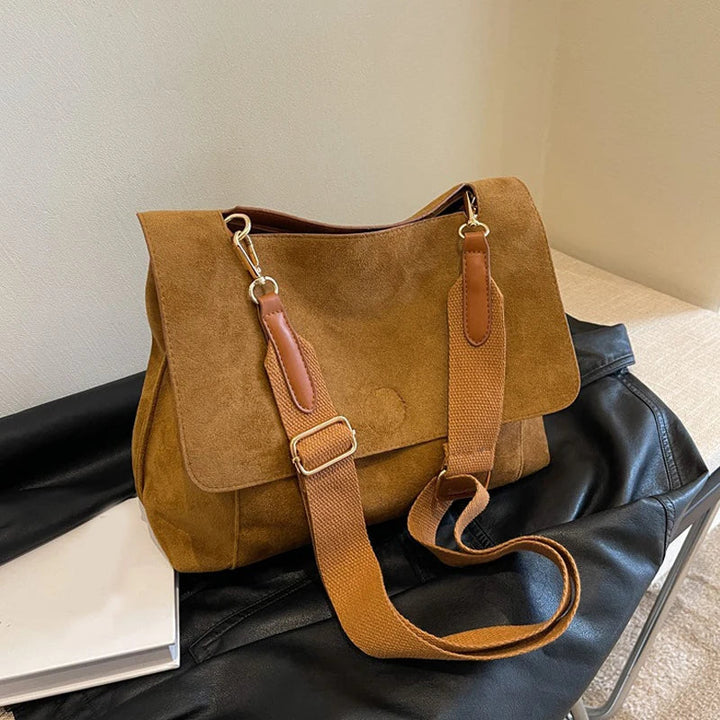 Suede bag with retro design