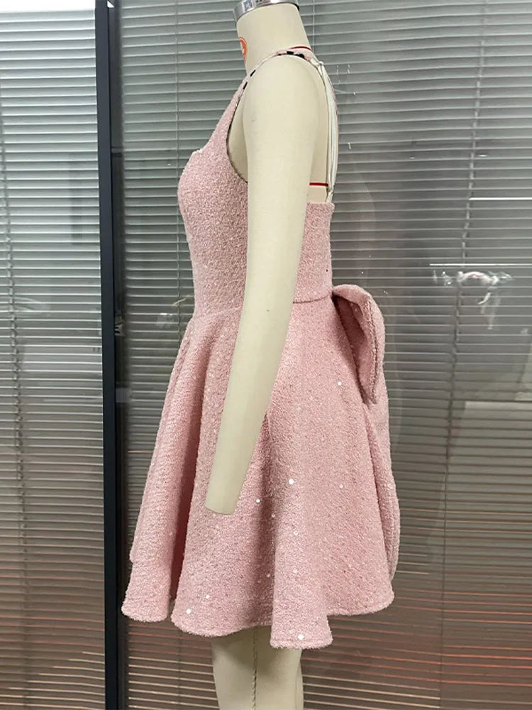 שמלת מיני פייטים בגזרת A בעיטור פפיון בגב - Alayna