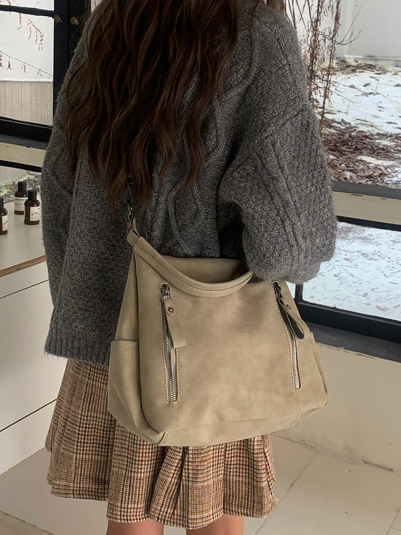 Bag with retro-style faux leather design