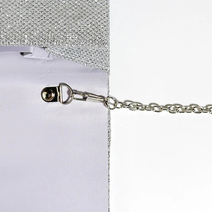 Clutch bag with sparkling studs and chain strap design