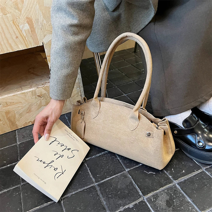 Suede bag with retro design