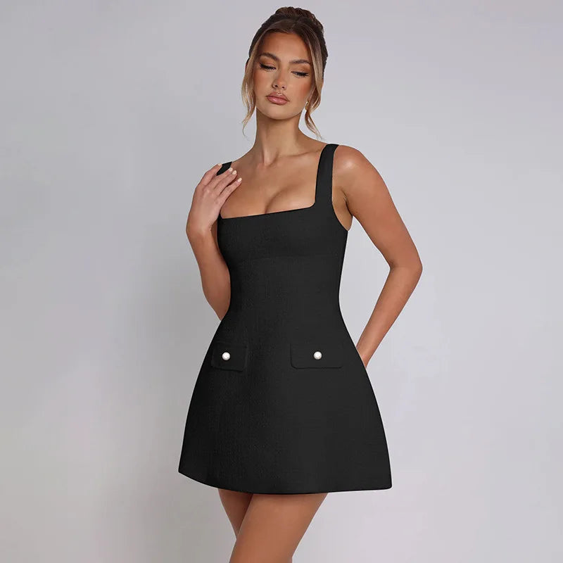 שמלת מיני בד ארוג בגזרת A בעיטור כיסים - מילי