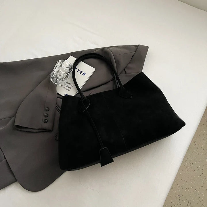 Suede bag with classic design