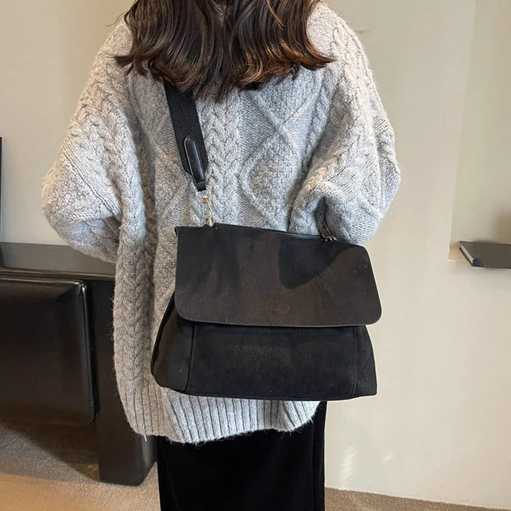 Suede bag with retro design