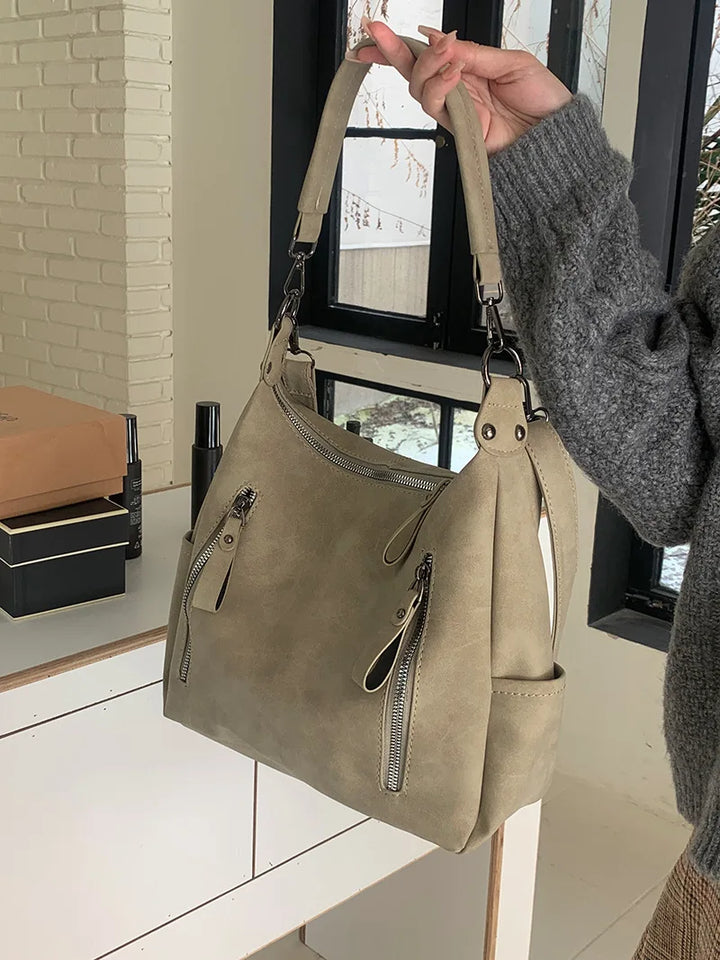 Bag with retro-style faux leather design