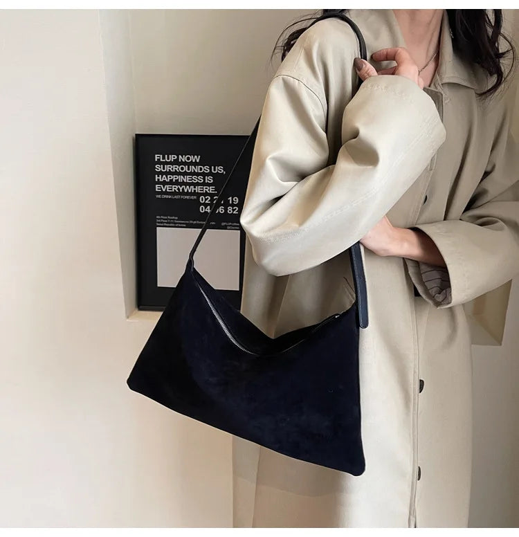 Suede bag with classic design