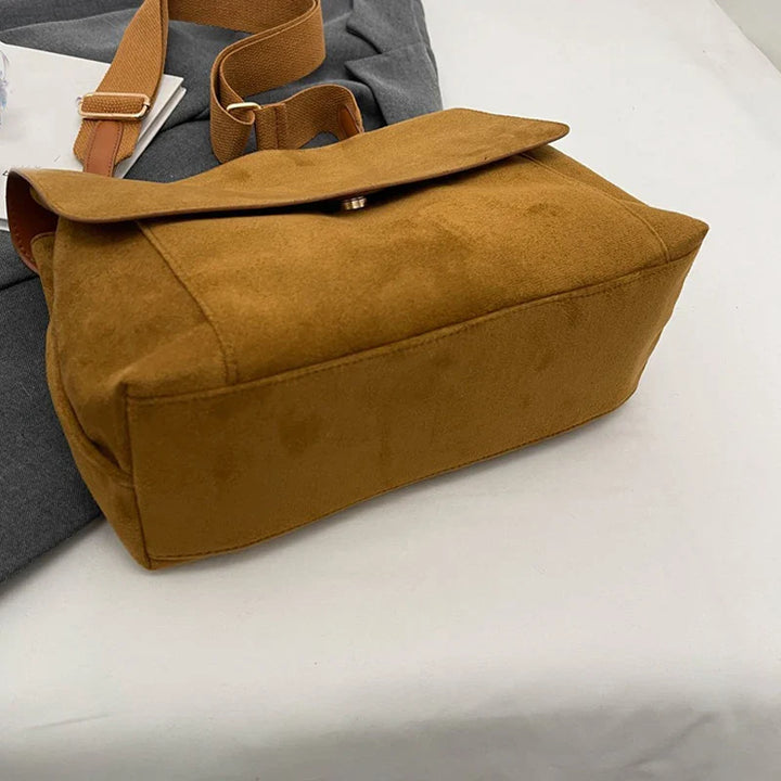 Suede bag with retro design