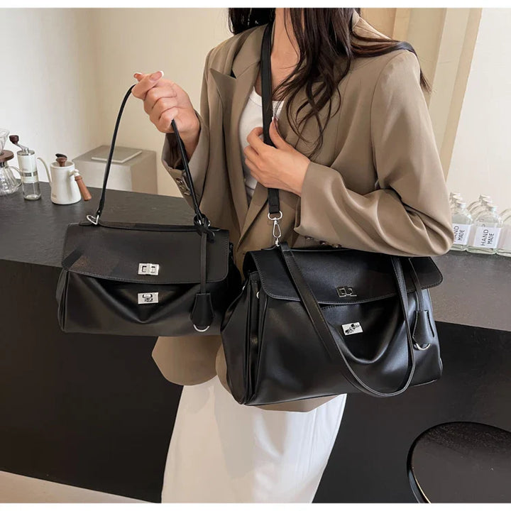Leather bag with buckle closure
