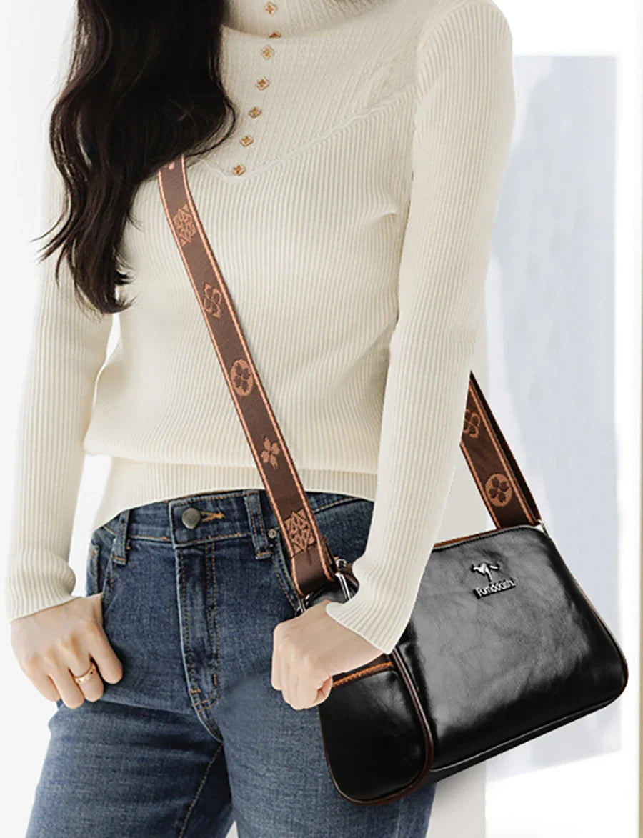 Faux leather bag with strap design