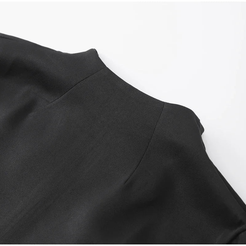 שמלת מיני מחויטת בגזרת שעון חול בעיטור כיסים - נילס