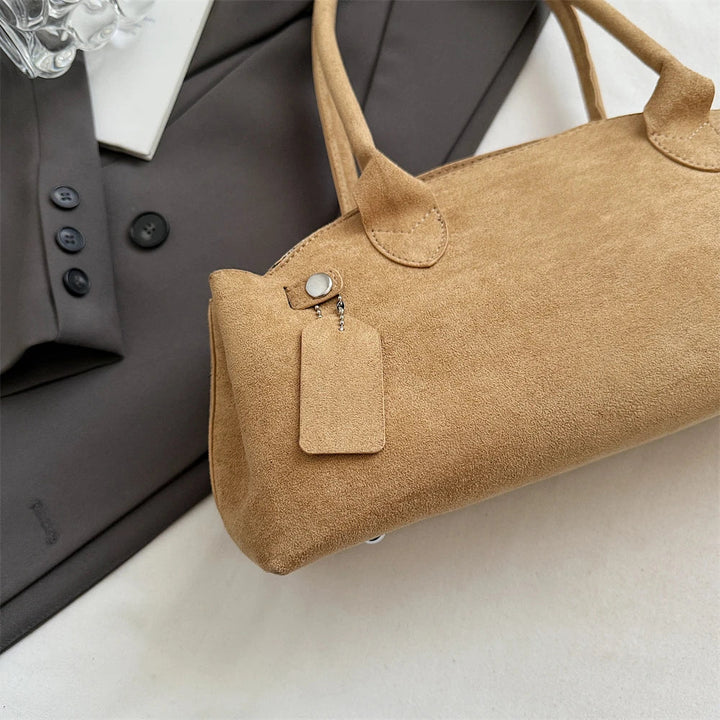 Suede bag with retro design