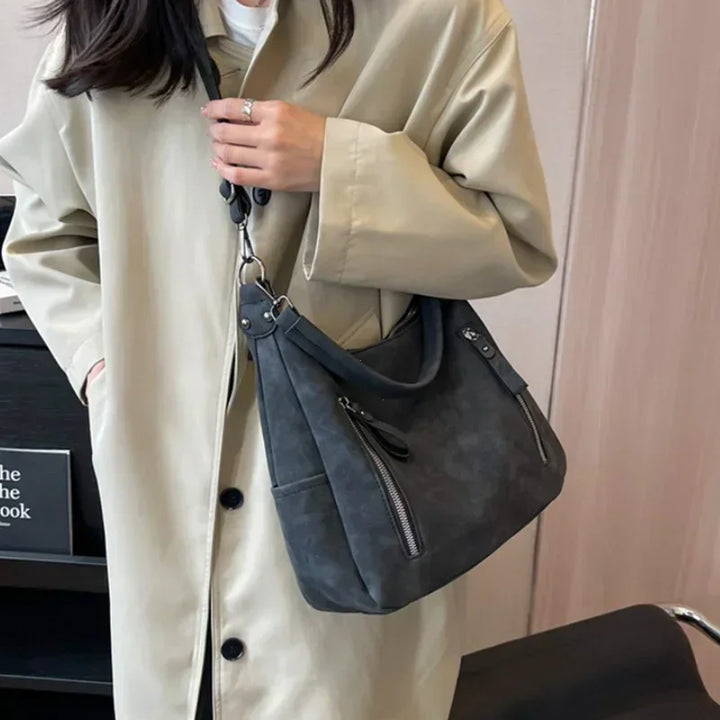Bag with retro-style faux leather design