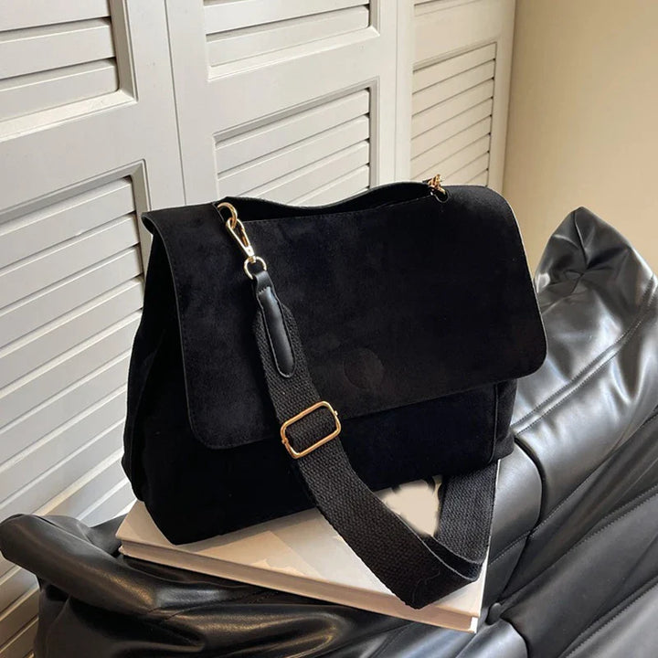 Suede bag with retro design