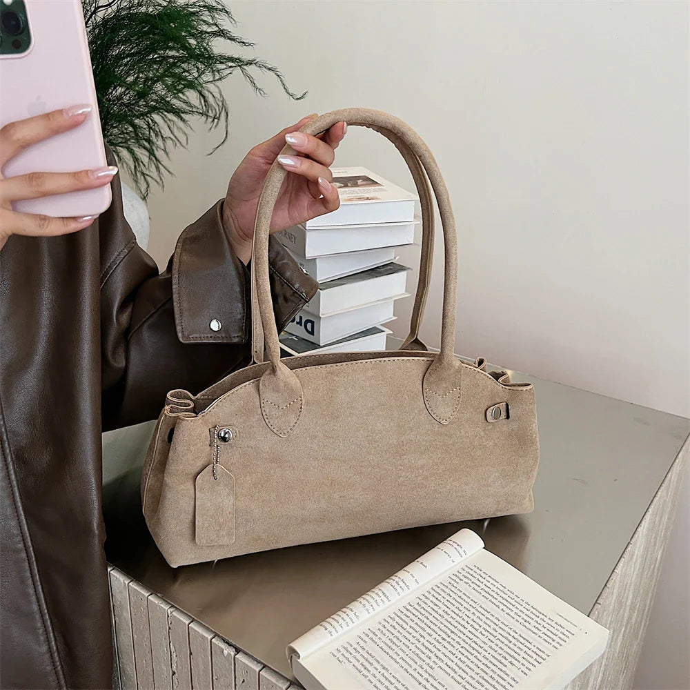 Suede bag with retro design