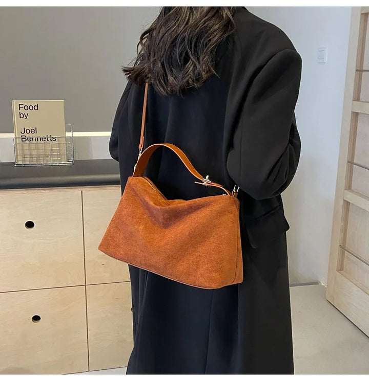 Suede bag with classic design