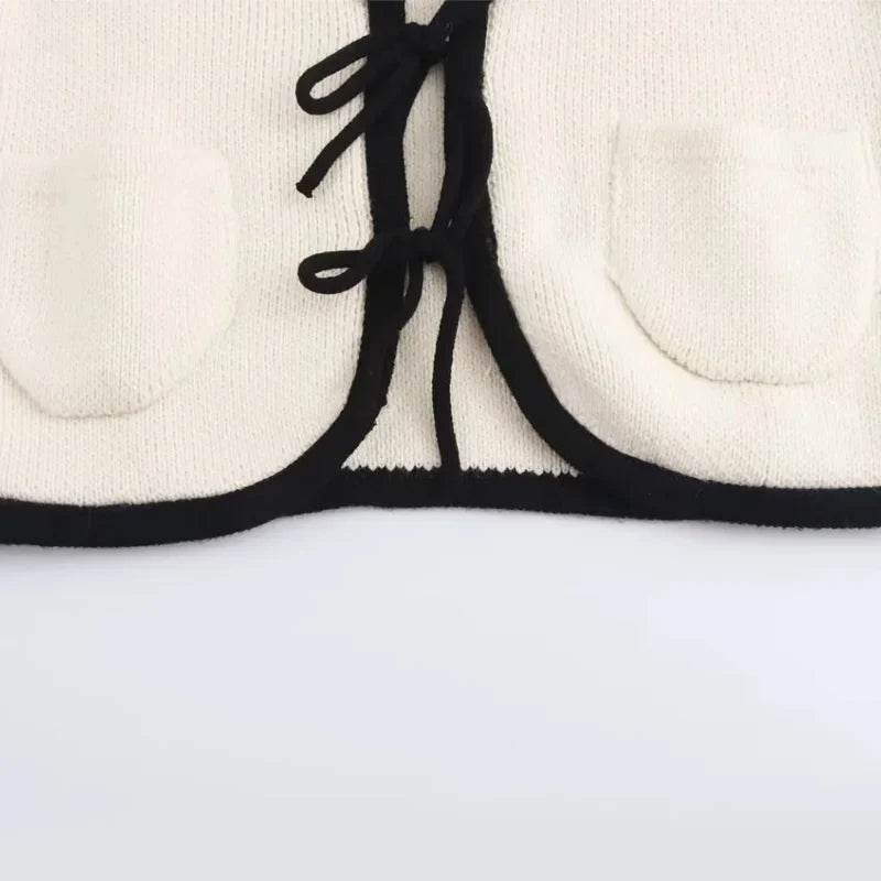 סוודר קשירות - מונה