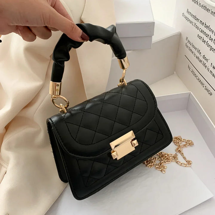 Faux leather handbag combined with chain strap