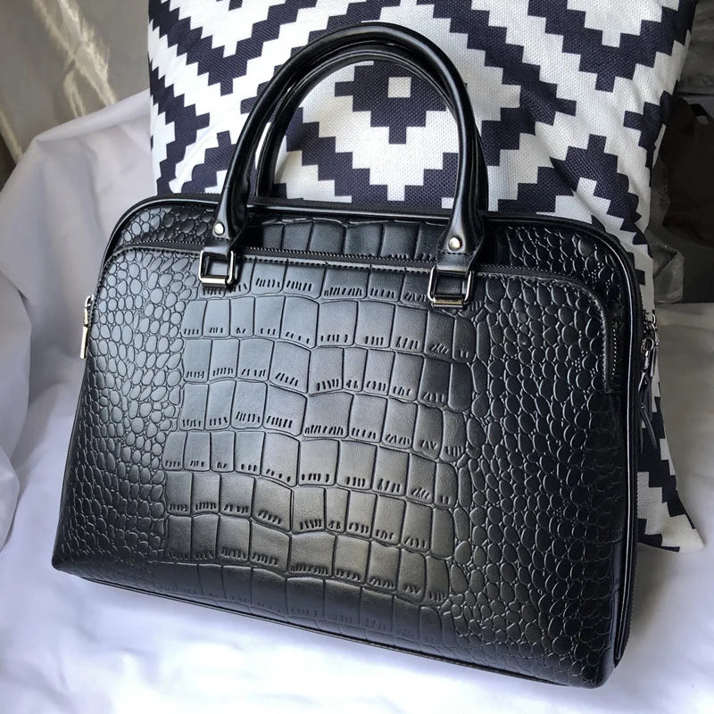 Leather bag with crocodile design