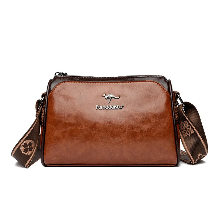 Faux leather bag with strap design