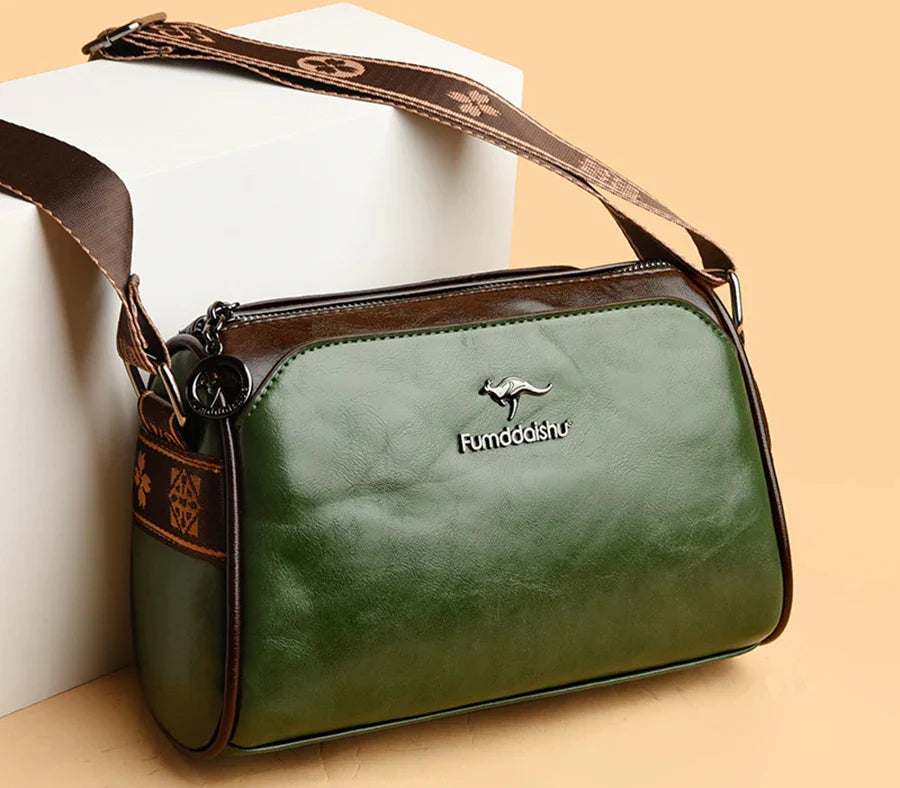 Faux leather bag with strap design