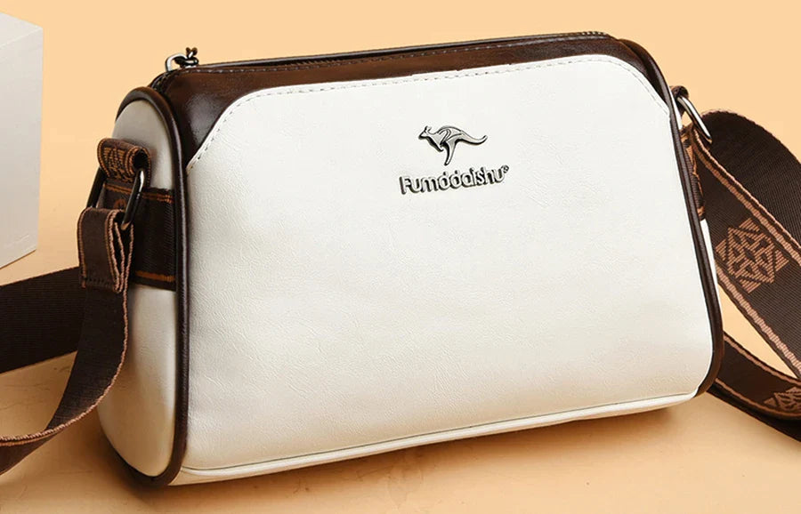 Faux leather bag with strap design