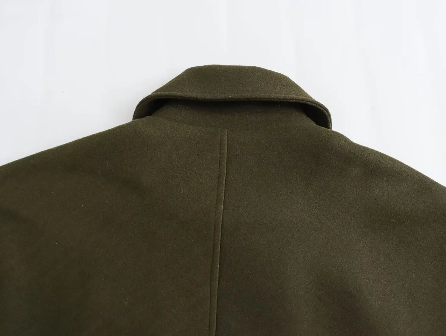 מעיל צמר אוברסייז בעיצוב סגירת כפתורים אסימטרית צווארון פולו - הולנדיה