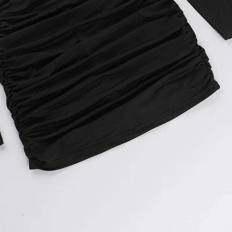 שמלת מיני צמודה בעיצוב פתחים ואבזמי זרקונים - מייס