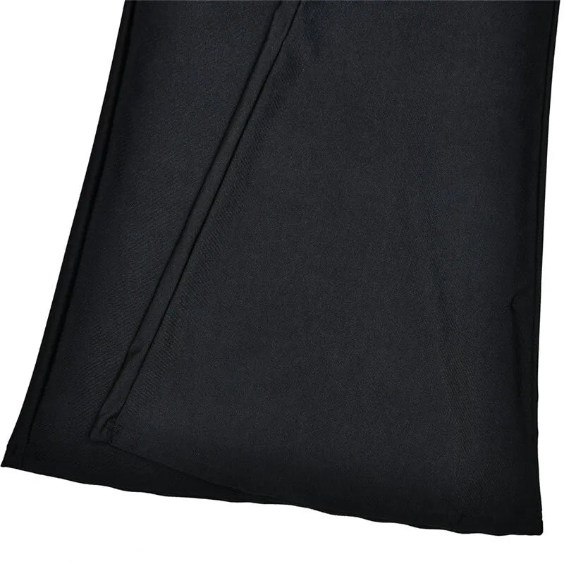 אוברול צמוד ארוך בד מחטב בעיצוב מחשוף V עמוק בעיטור קרוס - לייני