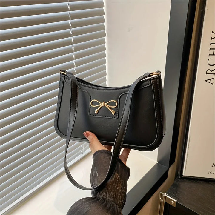 Faux leather bag with buckle design