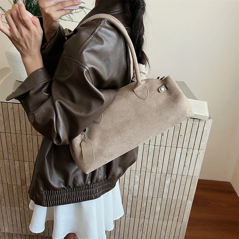 Suede bag with retro design