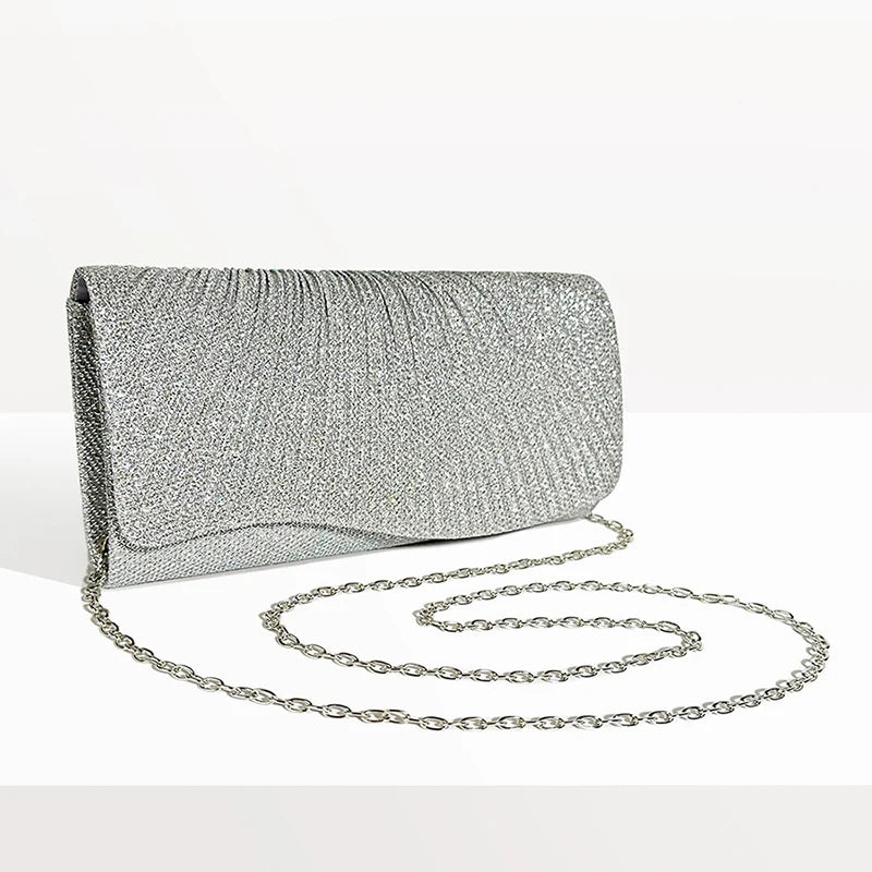Clutch bag with sparkling studs and chain strap design