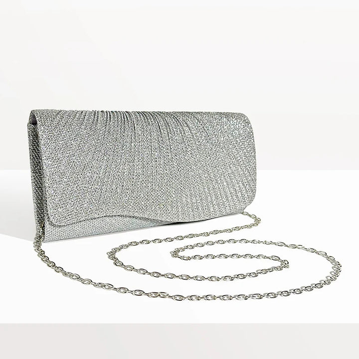 Clutch bag with sparkling studs and chain strap design