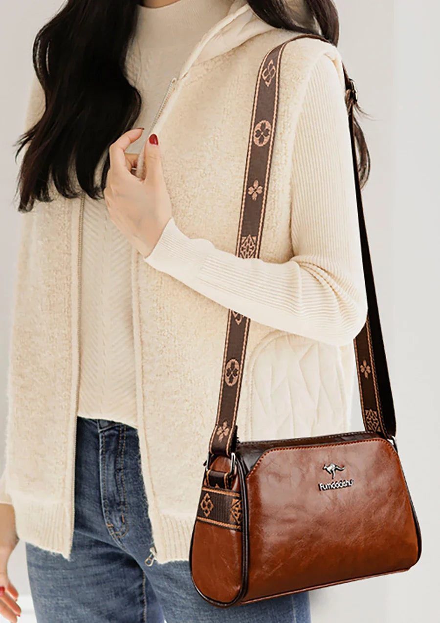 Faux leather bag with strap design