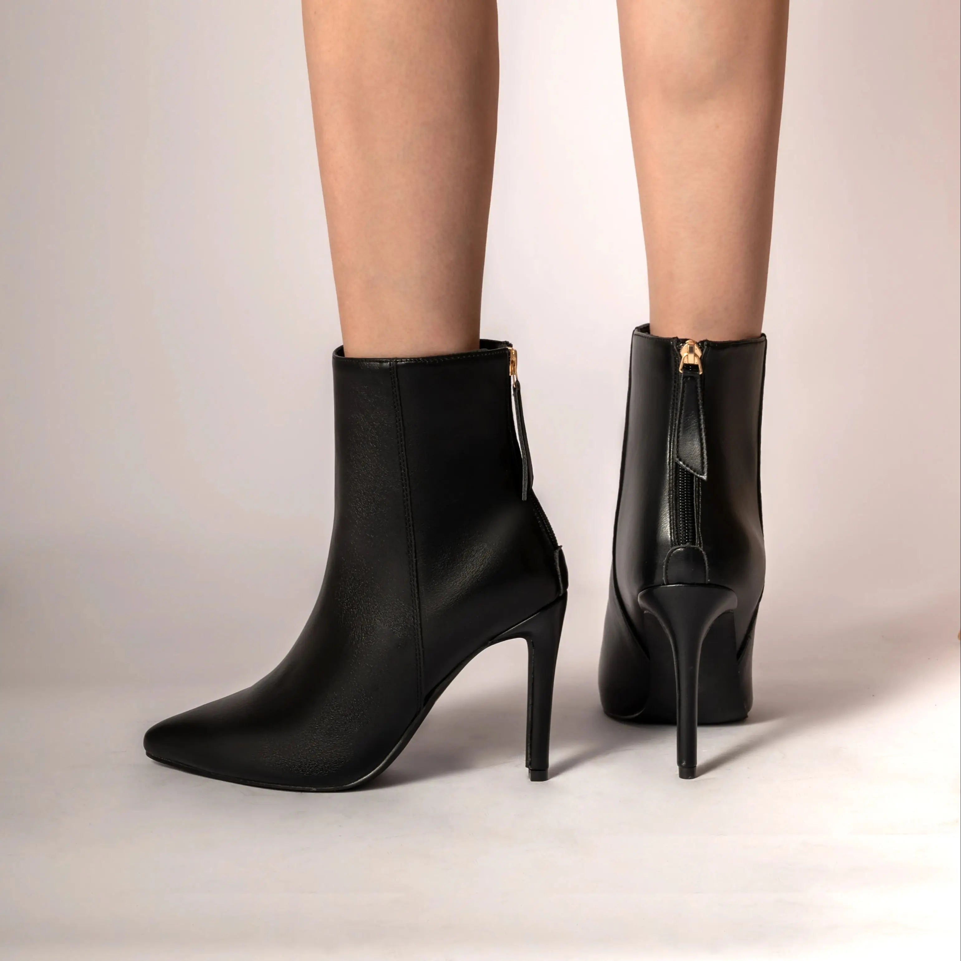 מגפי עקב דמוי עור שפיץ - טלי