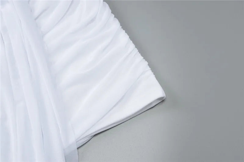 סט שני חלקים חצאית מיני כיווצים בעיטור שובל וחולצת רשת בעיצוב כיווצים - בריטני