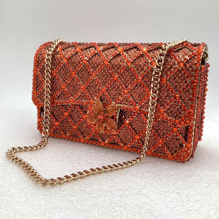 Sequin bag with diamond pattern and flower decoration