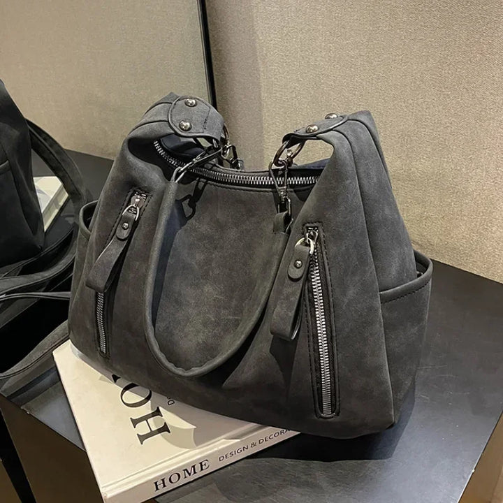 Bag with retro-style faux leather design